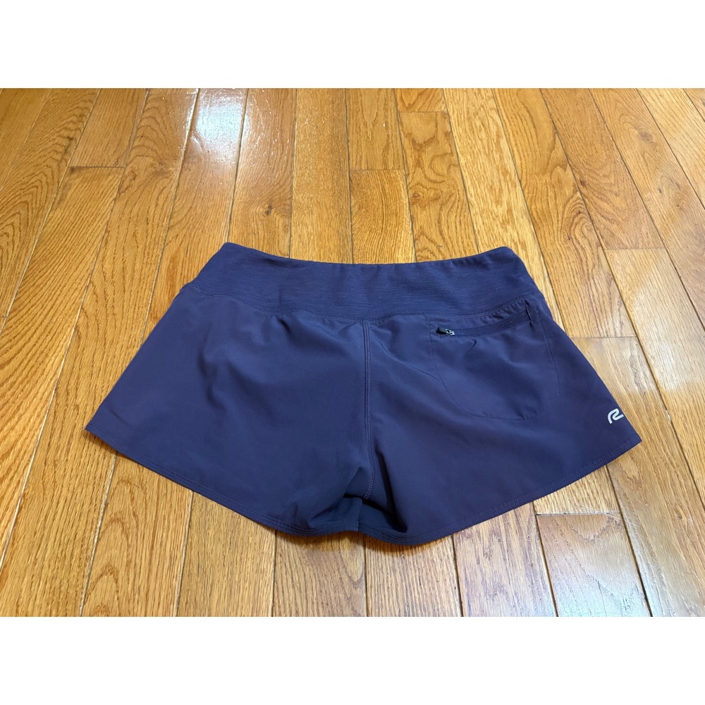 Road Runner Sports Womens Purple Running Shorts Size M Zipper Pocket Liner